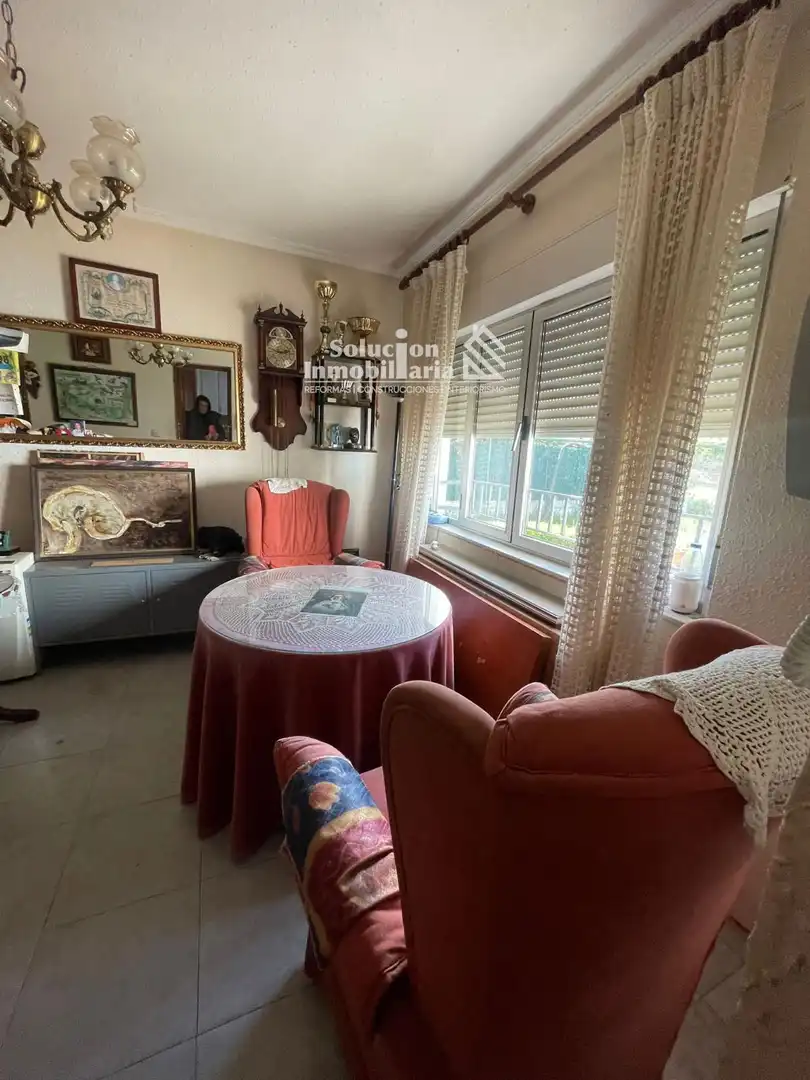 Sala de estar de Casa o chalet en venta en Doñinos de Salamanca con Calefacción y Amueblado