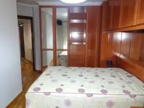 Schlafzimmer von Wohnung zur Miete in Gijón  mit Heizung, Parkett und Möbliert
