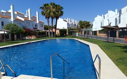 Swimming pool of Single-family semi-detached for sale in El Portil  with Terrace