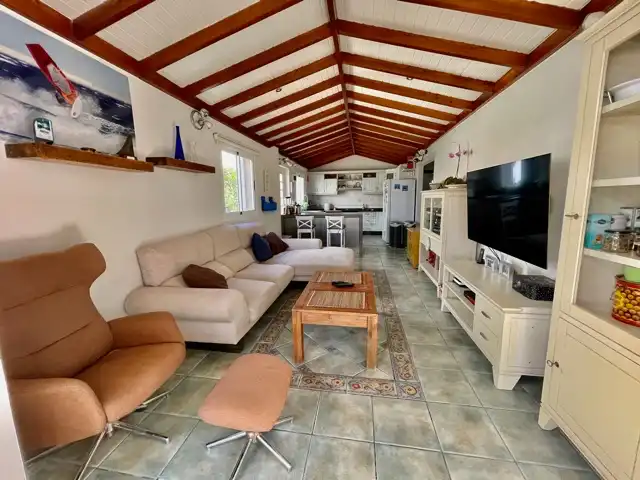 Sala d'estar de Casa adosada en venda en Granadilla de Abona amb Jardí privat, Terrassa i Piscina