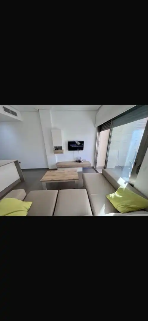 Sala d'estar de Apartament de lloguer en Guardamar del Segura amb Aire condicionat, Calefacció i Moblat