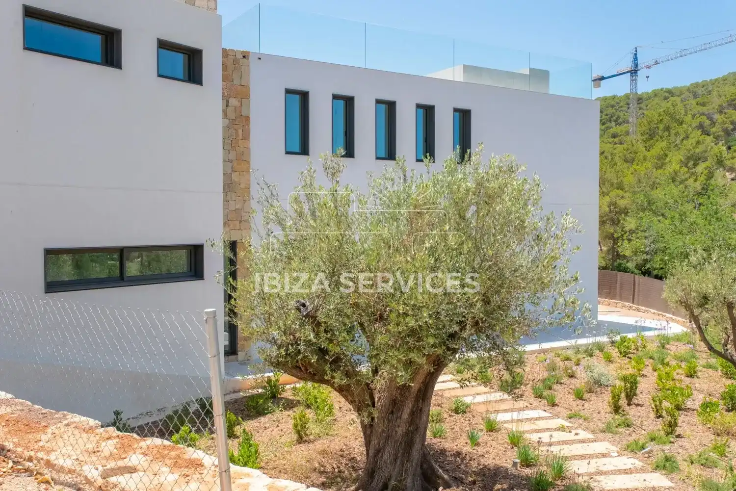 Vista exterior de Casa o xalet de lloguer en Santa Eulària des Riu amb Aire condicionat, Jardí privat i Piscina