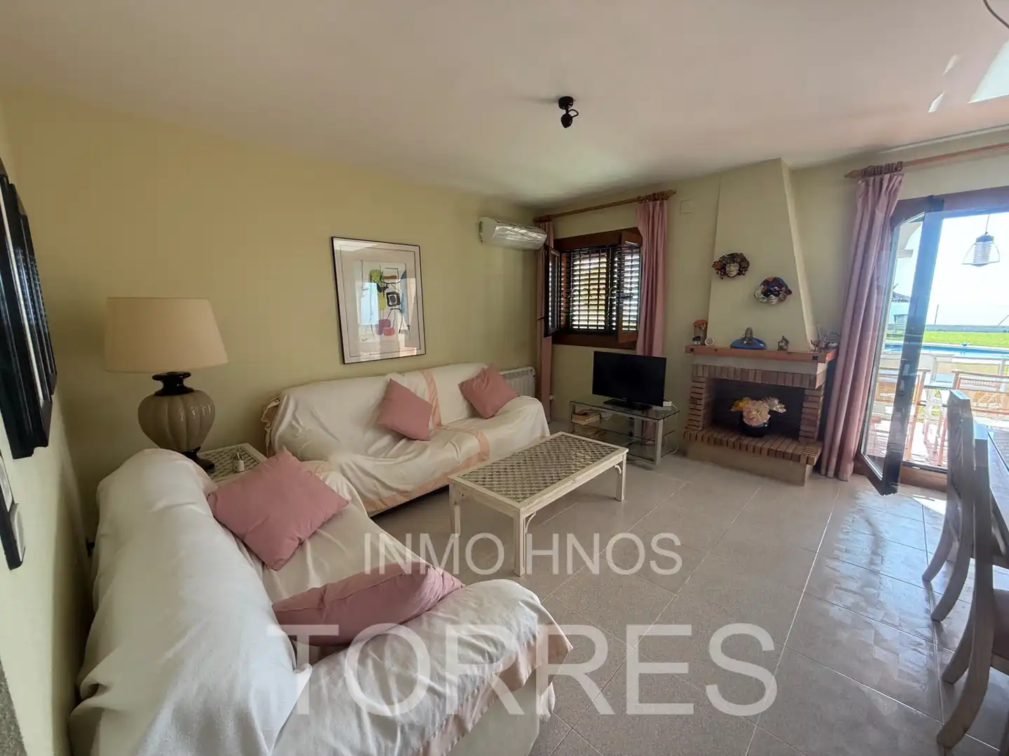 Sala de estar de Casa adosada en venta en Benicarló con Aire acondicionado, Jardín privado y Terraza