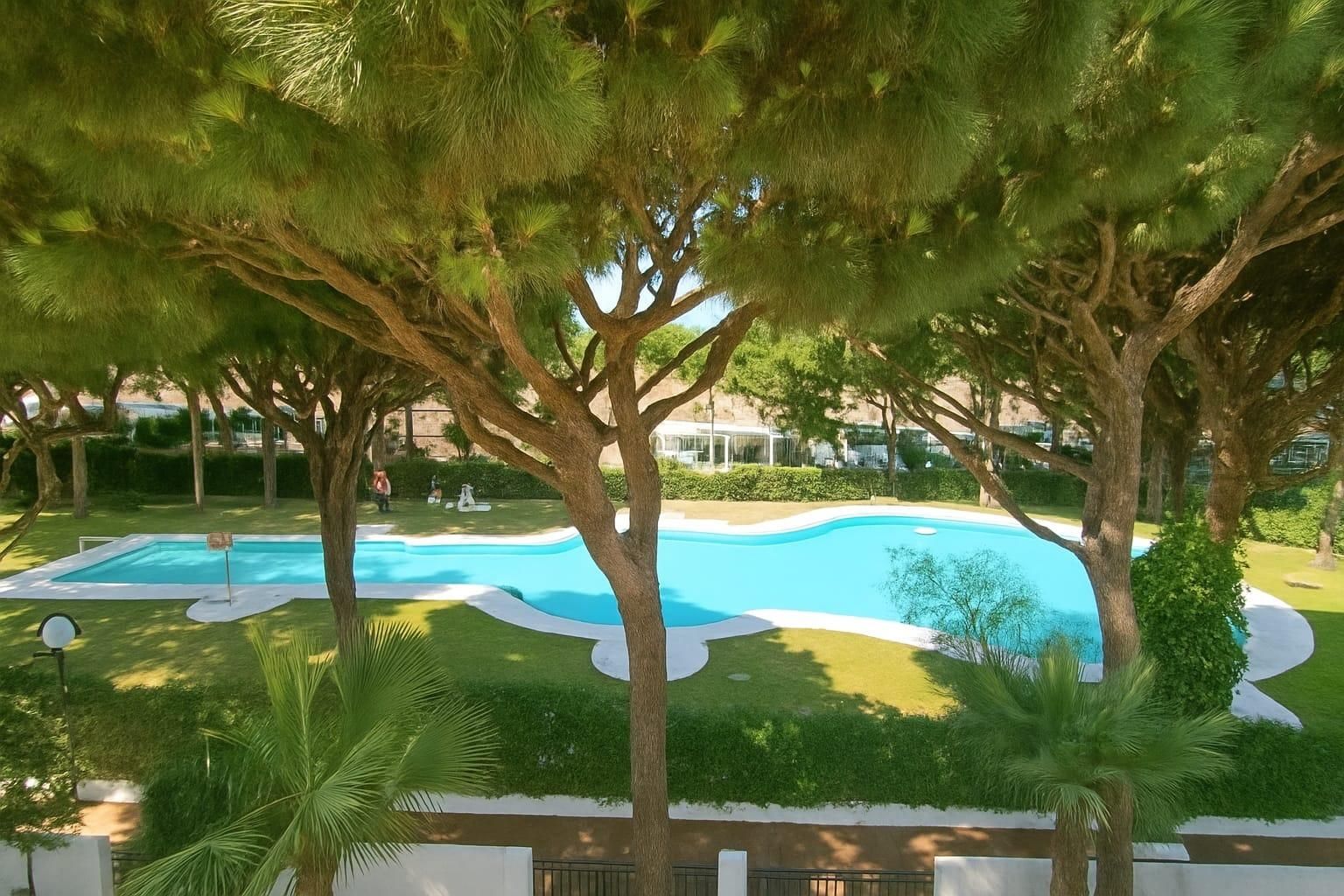 Schwimmbecken von Wohnungen zum verkauf in Chiclana de la Frontera mit Privatgarten, Terrasse und Gemeinschaftspool