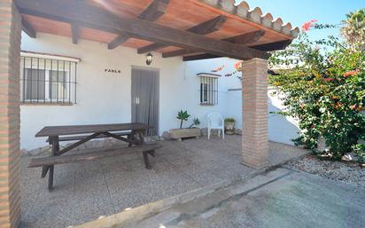 Jardí de Casa adosada de lloguer en Conil de la Frontera amb Aire condicionat