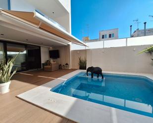 Swimming pool of Single-family semi-detached for sale in Algemesí  with Air Conditioner, Heating and Private garden