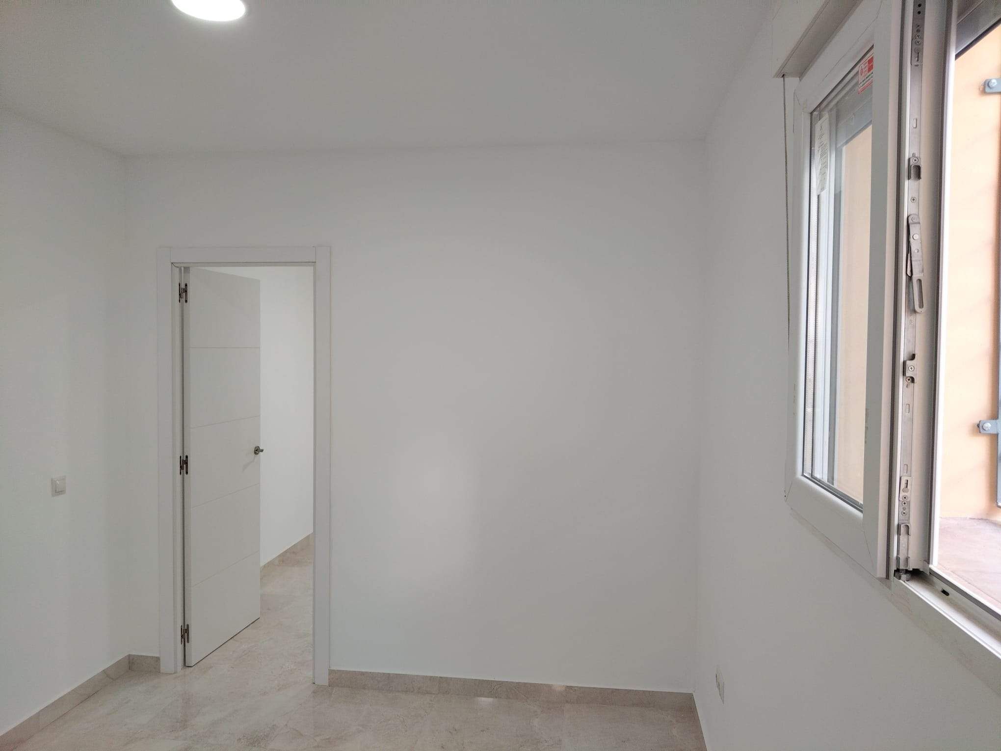 Dormitori de Apartament de lloguer en Málaga Capital amb Calefacció