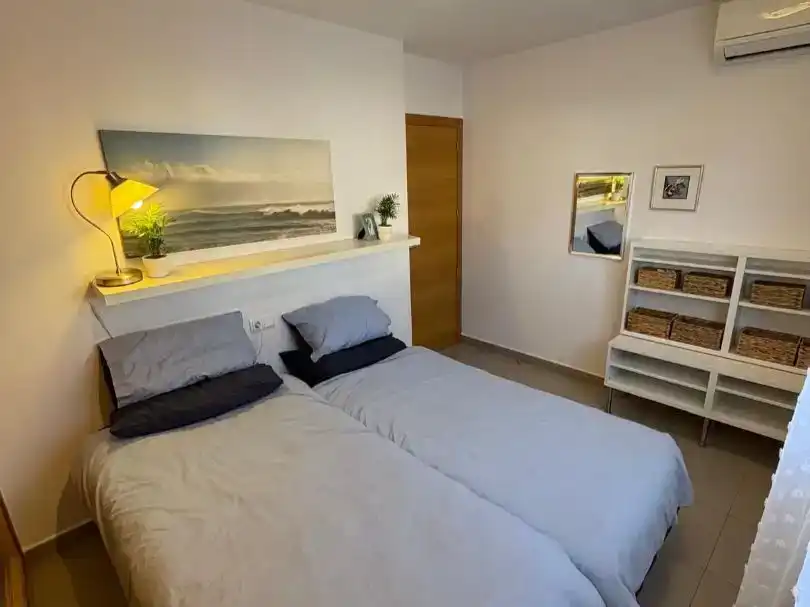 Dormitori de Apartament de lloguer en Torre-Pacheco amb Aire condicionat, Jardí privat i Moblat