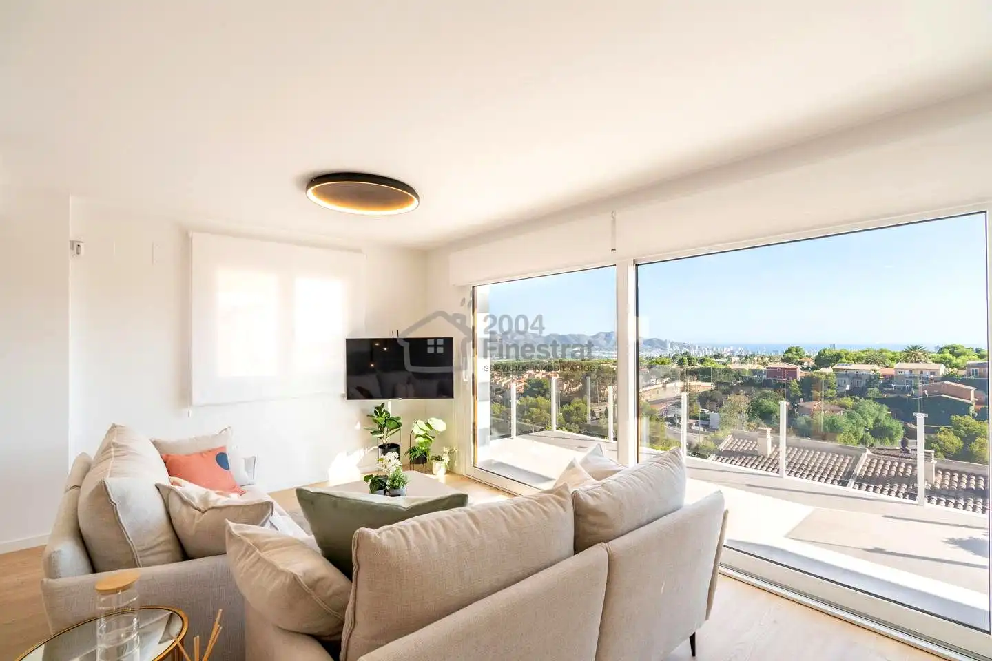 Sala de estar de Casa adosada en venta en La Nucia con Aire acondicionado, Jardín privado y Terraza