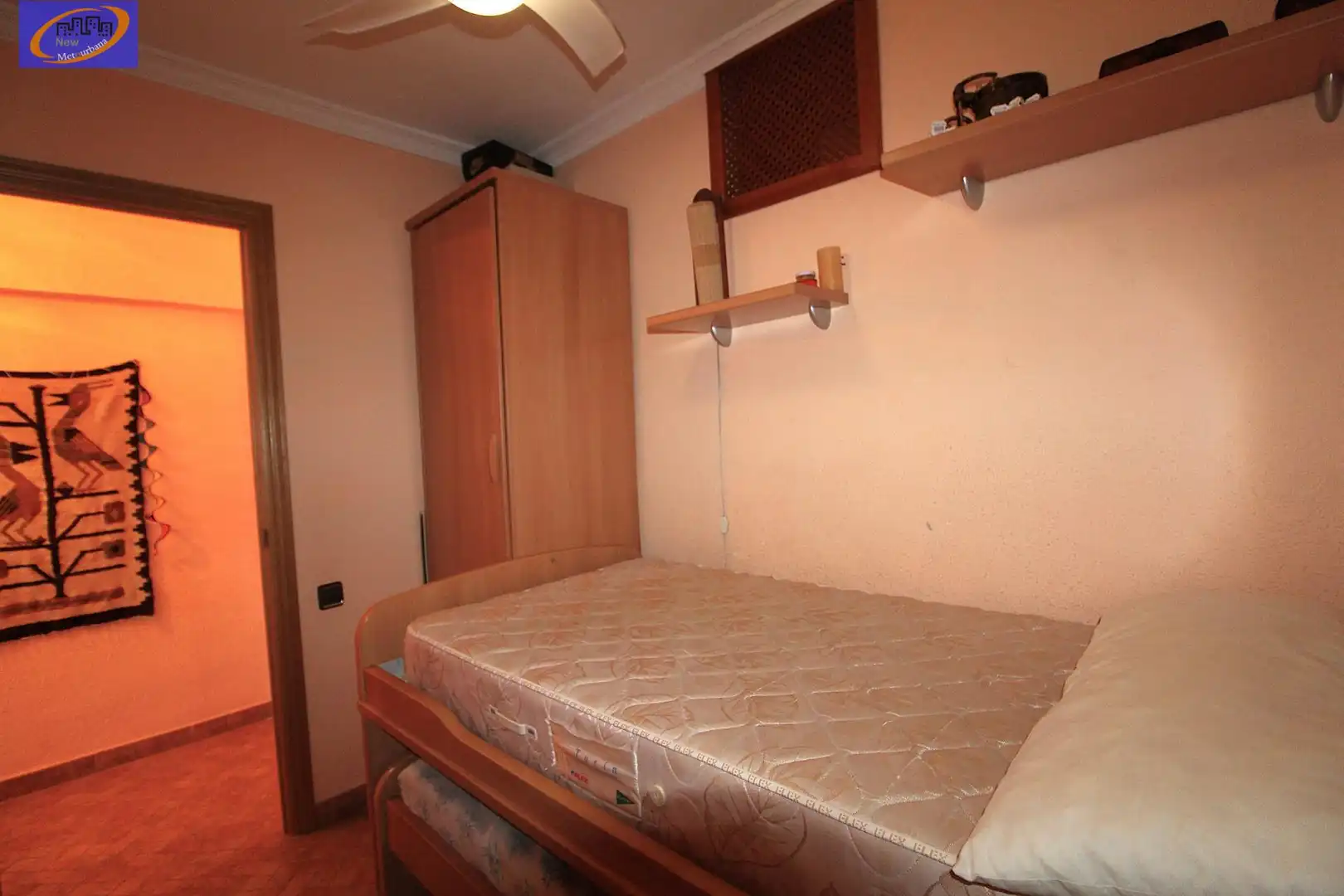 Dormitori de Apartament de lloguer en La Pobla de Farnals amb Jardí privat, Moblat i Piscina comunitària