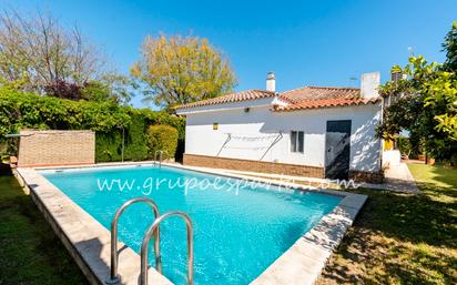 Swimming pool of House or chalet for sale in Espartinas  with Air Conditioner, Private garden and Storage room