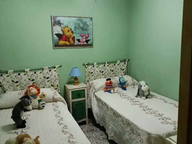 Dormitori de Casa adosada en venda en Alcuéscar amb Balcó