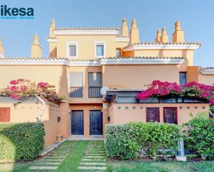 Exterior view of Duplex for sale in Islantilla  with Private garden, Terrace and Community pool