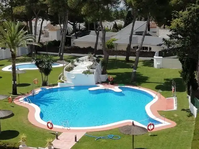 Piscina de Apartament en venda en El Puerto de Santa María amb Calefacció, Jardí privat i Piscina comunitària