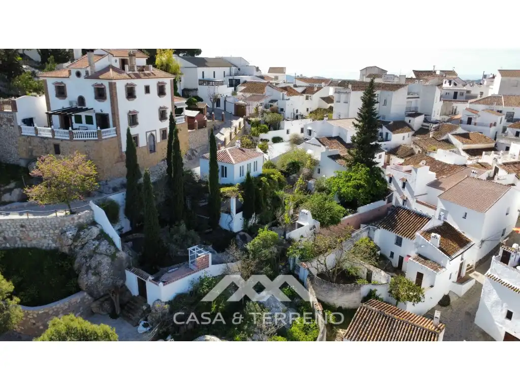 Vista exterior de Casa adosada en venta en Comares con Aire acondicionado, Terraza y Piscina