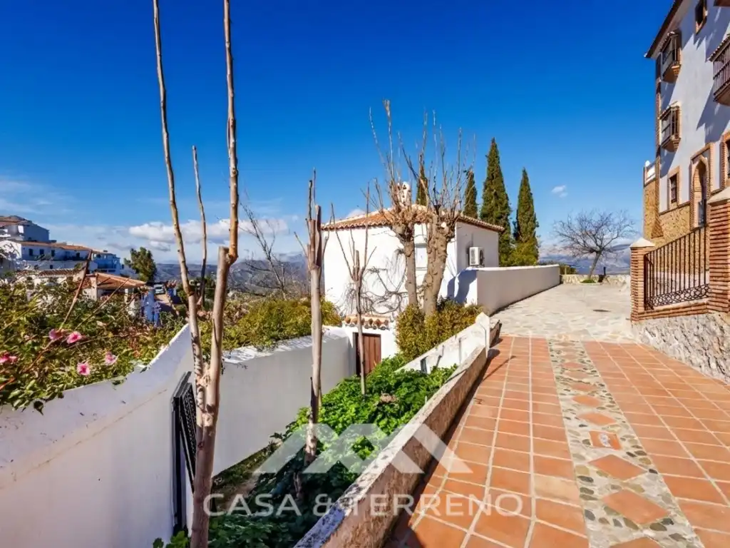 Vista exterior de Casa adosada en venta en Comares con Aire acondicionado, Terraza y Piscina