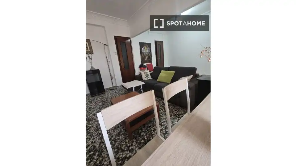 Sala de estar de Apartamento para compartir en Valencia con Aire acondicionado, Terraza y Amueblado