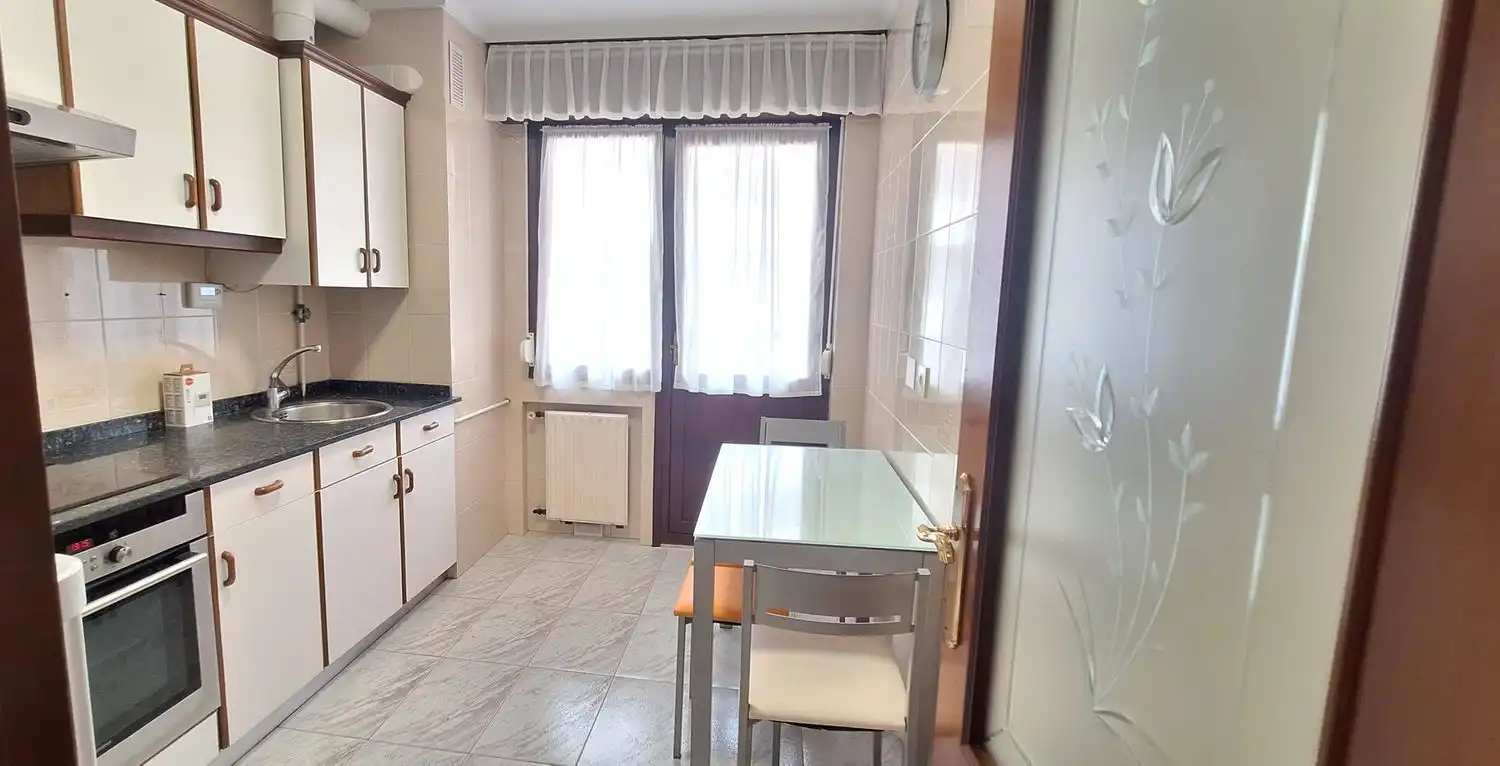 Kitchen of Flat for rent in Gijón   with Heating, Terrace and Swimming Pool