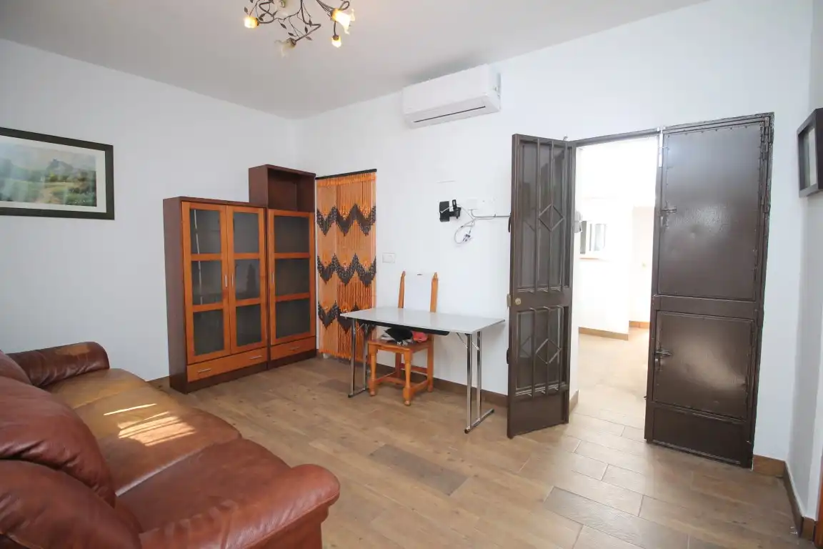 Sala d'estar de Casa adosada en venda en Vélez-Málaga amb Aire condicionat, Calefacció i Terrassa