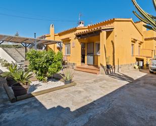 Exterior view of House or chalet for sale in Castelló d'Empúries  with Air Conditioner, Private garden and Terrace
