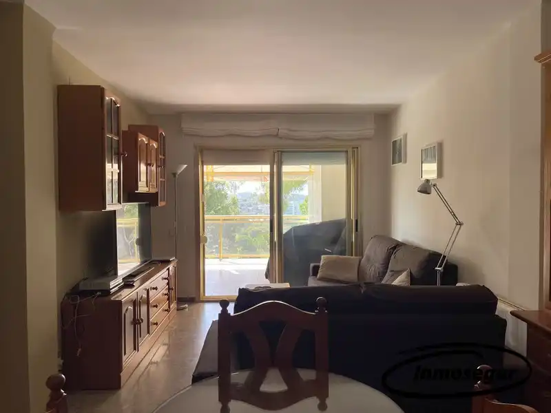 Sala de estar de Piso en venta en Salou con Terraza, Amueblado y Piscina comunitaria