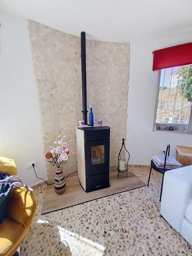Sala d'estar de Casa o xalet en venda en La Nucia amb Aire condicionat, Jardí privat i Terrassa