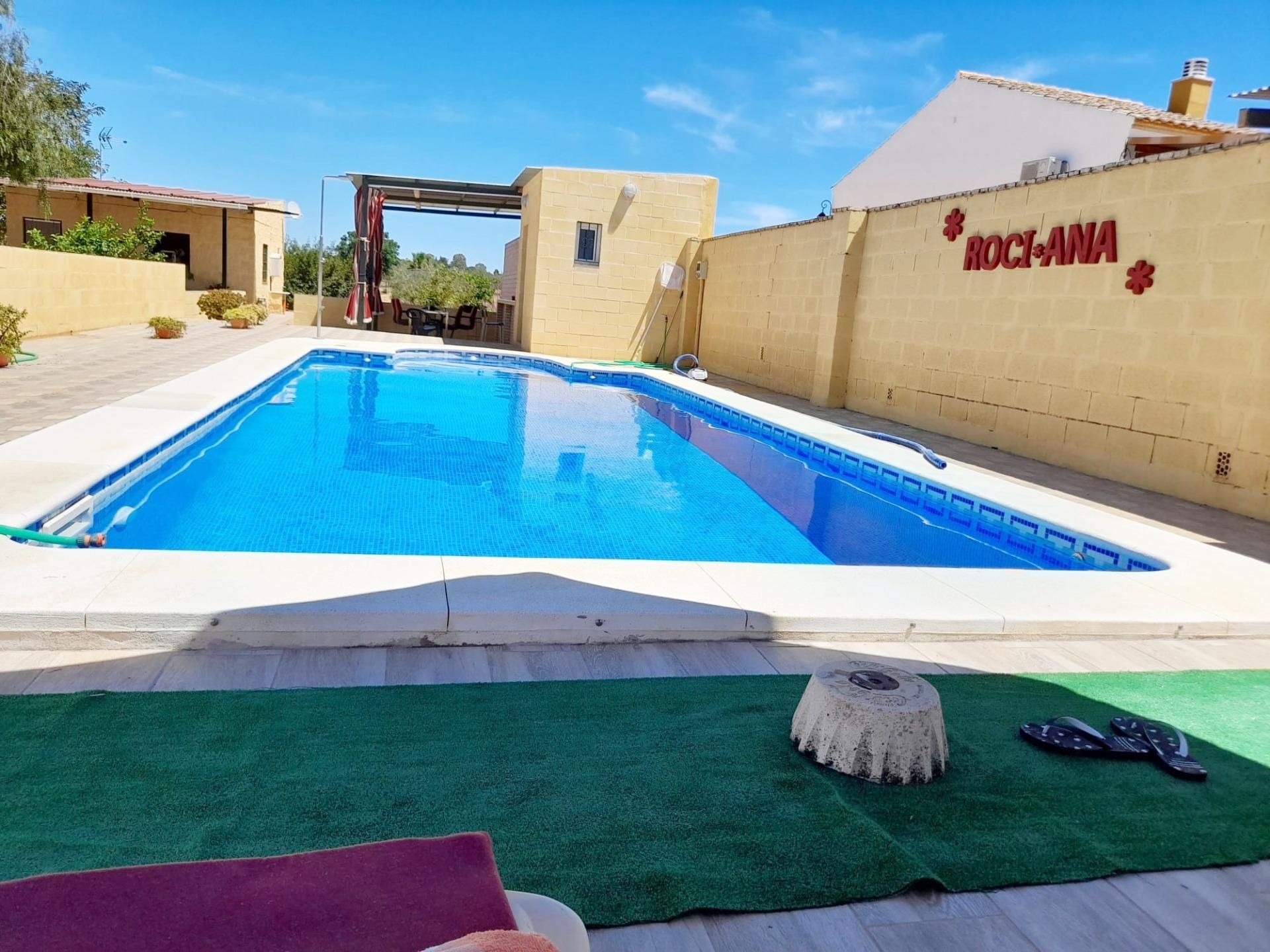 Piscina de Finca rústica en venda en Villanueva del Ariscal