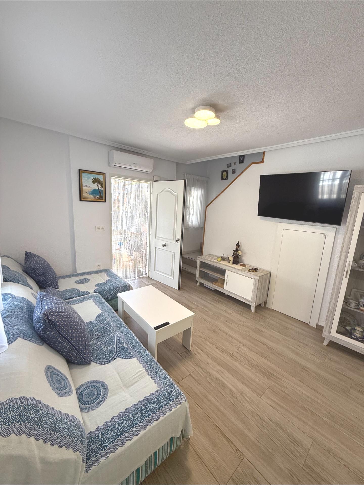 Sala d'estar de Casa o xalet en venda en Santa Pola amb Aire condicionat, Calefacció i Jardí privat