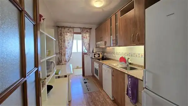 Cocina de Apartamento en venta en La Manga del Mar Menor con Aire acondicionado, Calefacción y Terraza