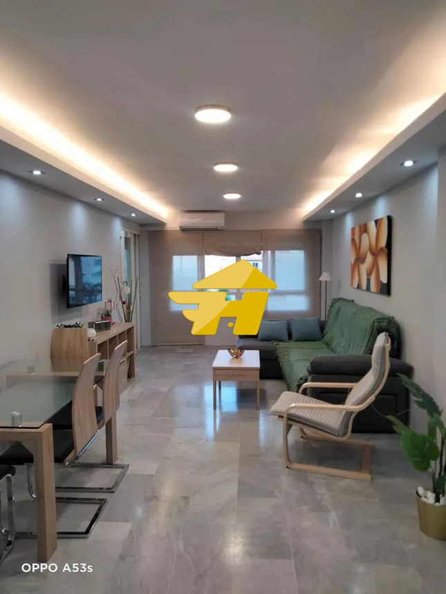 Sala de estar de Piso de alquiler en Torremolinos con Aire acondicionado, Jardín privado y Piscina