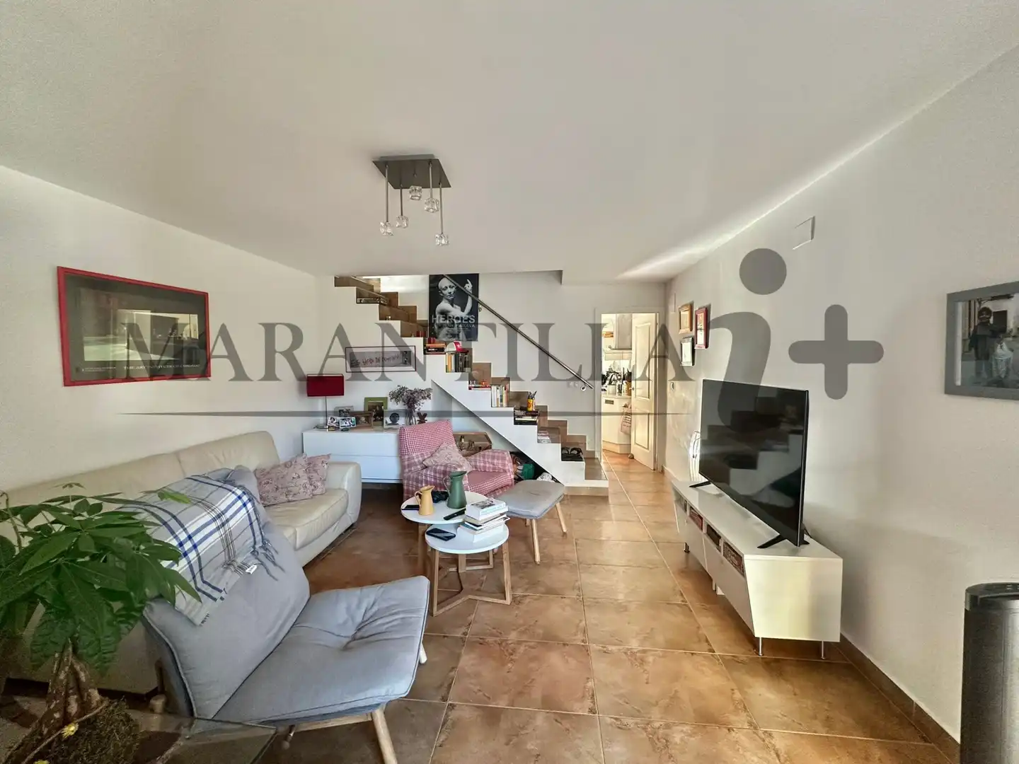Sala d'estar de Casa adosada en venda en La Antilla amb Aire condicionat, Terrassa i Traster