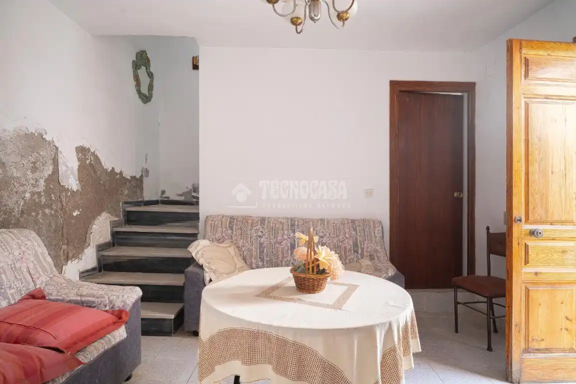 Sala de estar de Casa adosada en venta en Molvízar