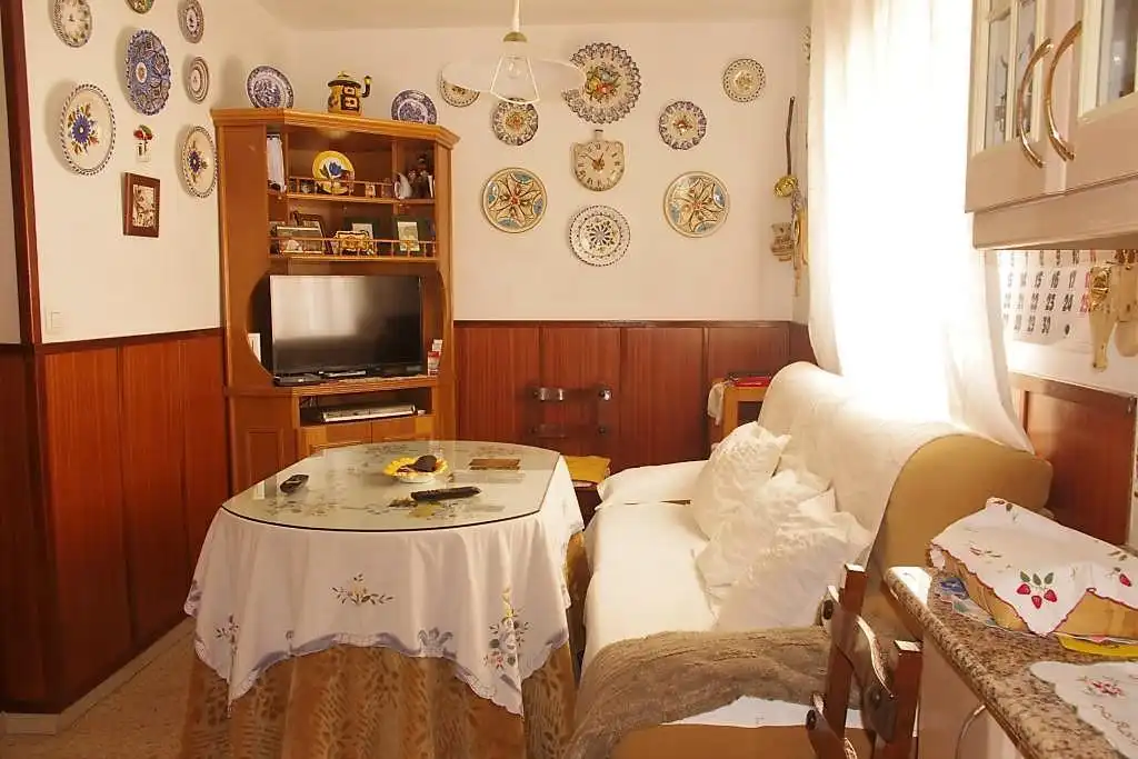 Sala d'estar de Casa adosada en venda en Coria amb Jardí privat i Balcó