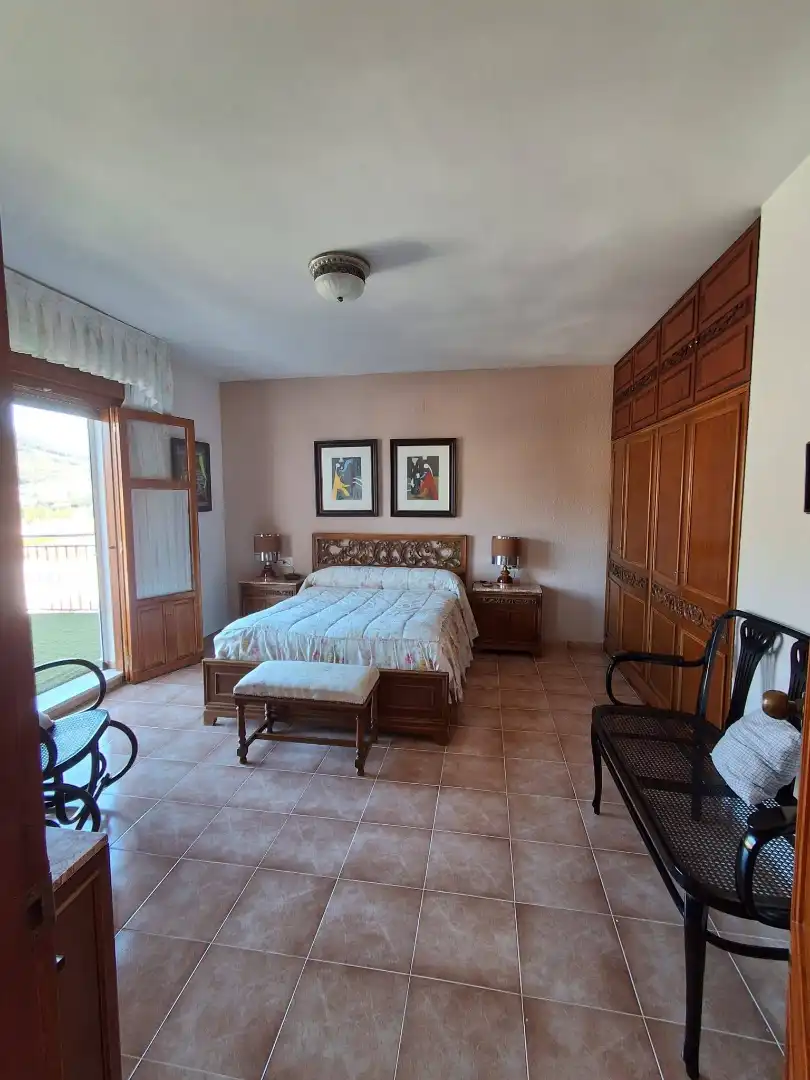Schlafzimmer von Haus oder Chalet zum Verkauf in Loja mit Heizung, Privatgarten und Terrasse