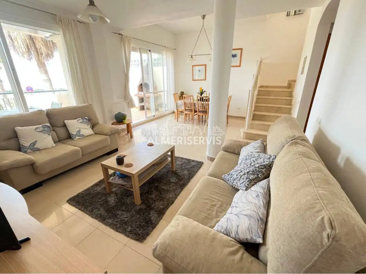 Sala de estar de Casa adosada en venta en El Ejido con Aire acondicionado, Terraza y Amueblado