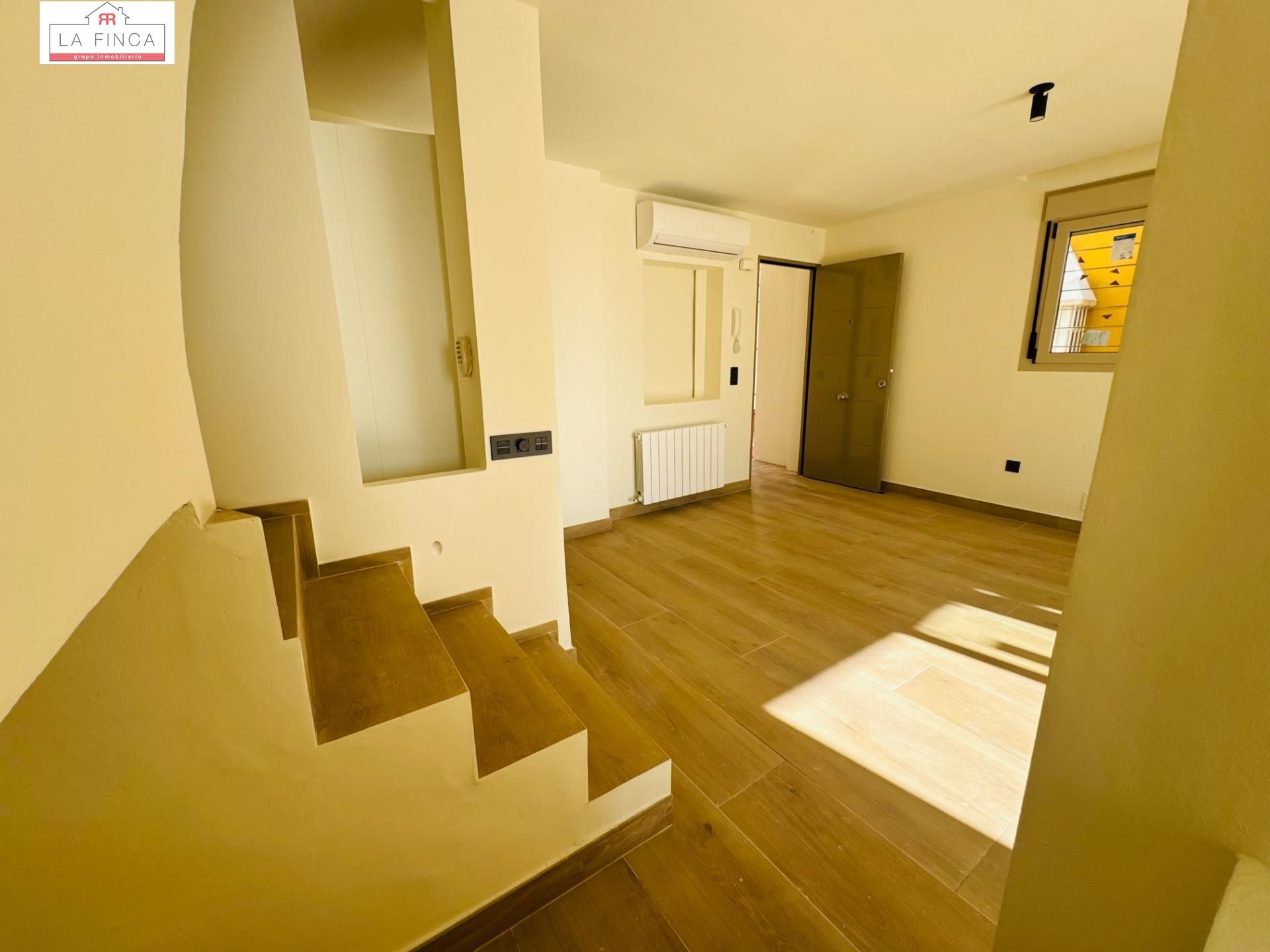 Sala de estar de Casa adosada en venta en Málaga Capital con Aire acondicionado y Terraza