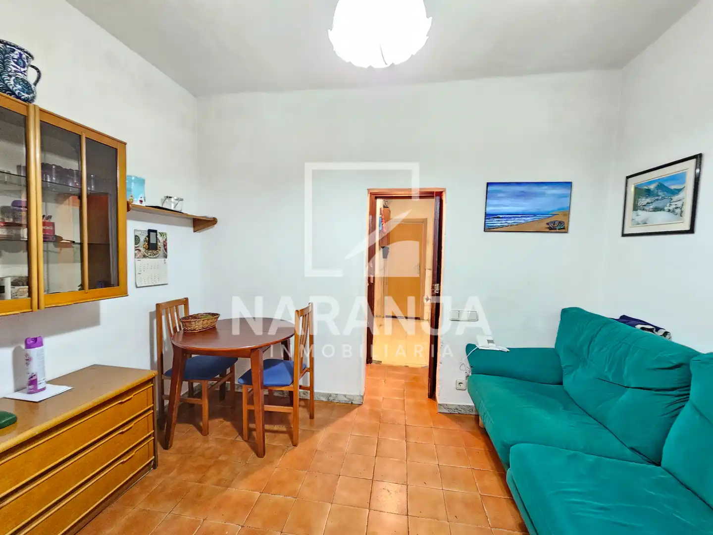 Sala d'estar de Casa adosada en venda en Barcelona amb Terrassa