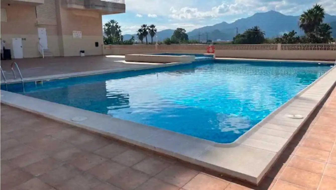 Piscina de Apartamento en venta en Xeraco con Aire acondicionado, Calefacción y Jardín privado