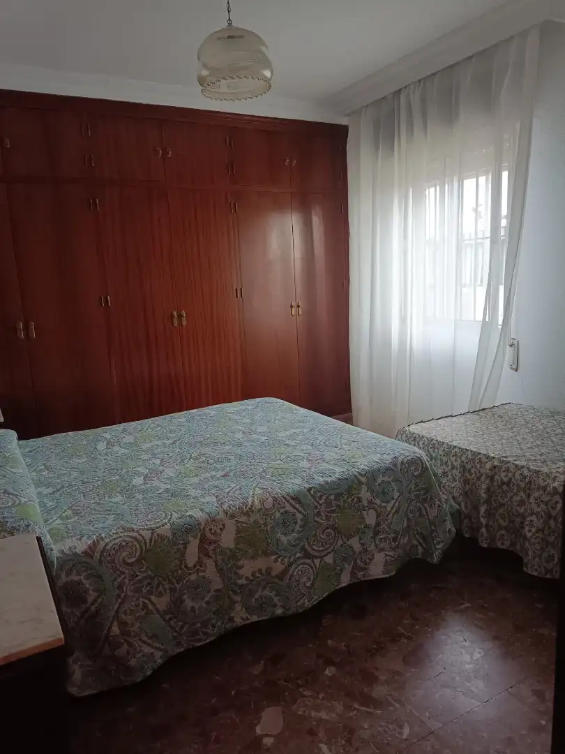 Schlafzimmer von Dachboden zum Verkauf in Punta Umbría mit Terrasse, Möbliert und Ofen