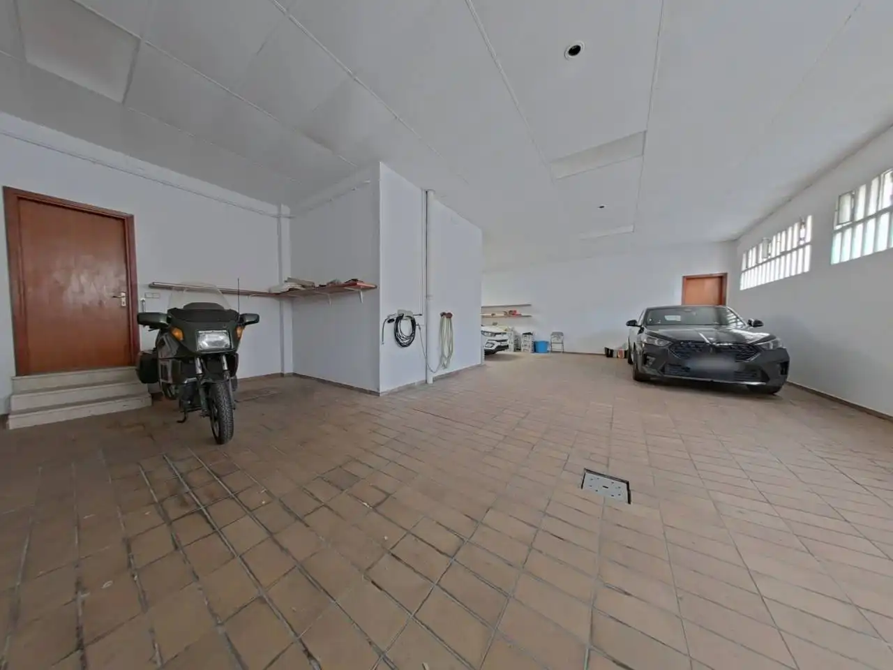 Aparcament de Casa adosada en venda en Centre