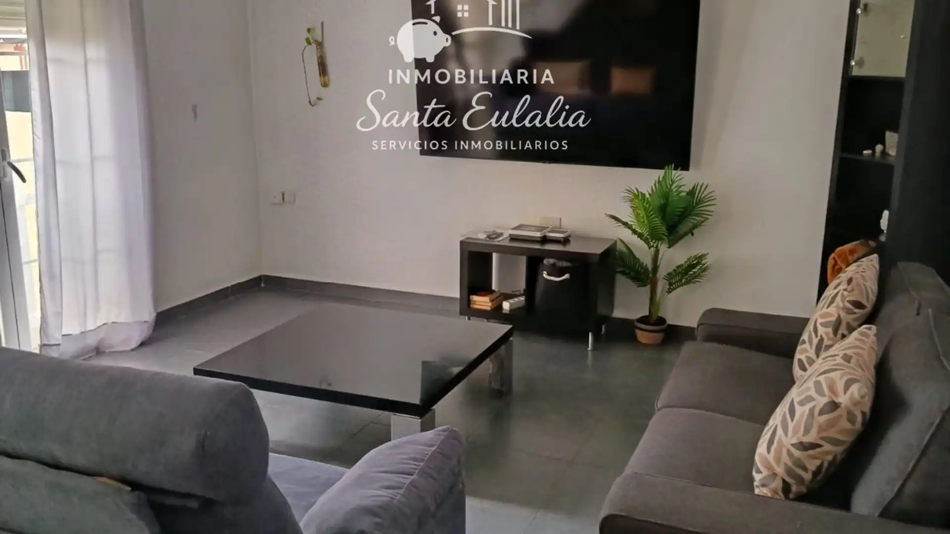 Sala de estar de Casa adosada en venta en Mérida con Aire acondicionado, Parquet y Horno