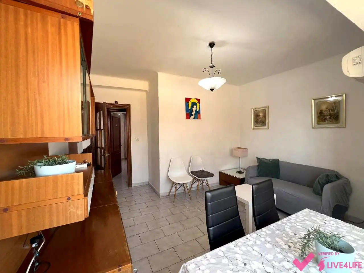 Sala de estar de Piso para compartir en Sevilla con Aire acondicionado, Calefacción y Amueblado
