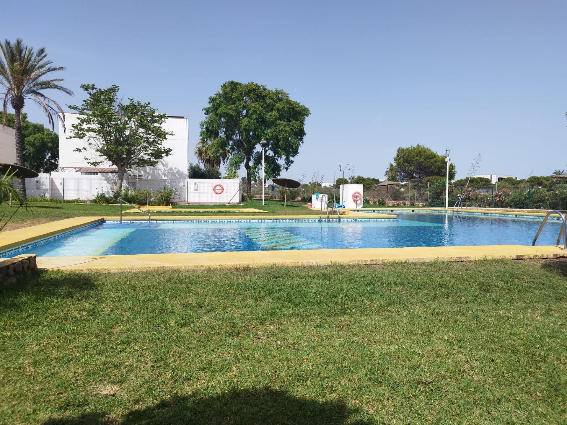 Swimming pool of Flat for sale in  Almería Capital  with Air Conditioner, Private garden and Terrace