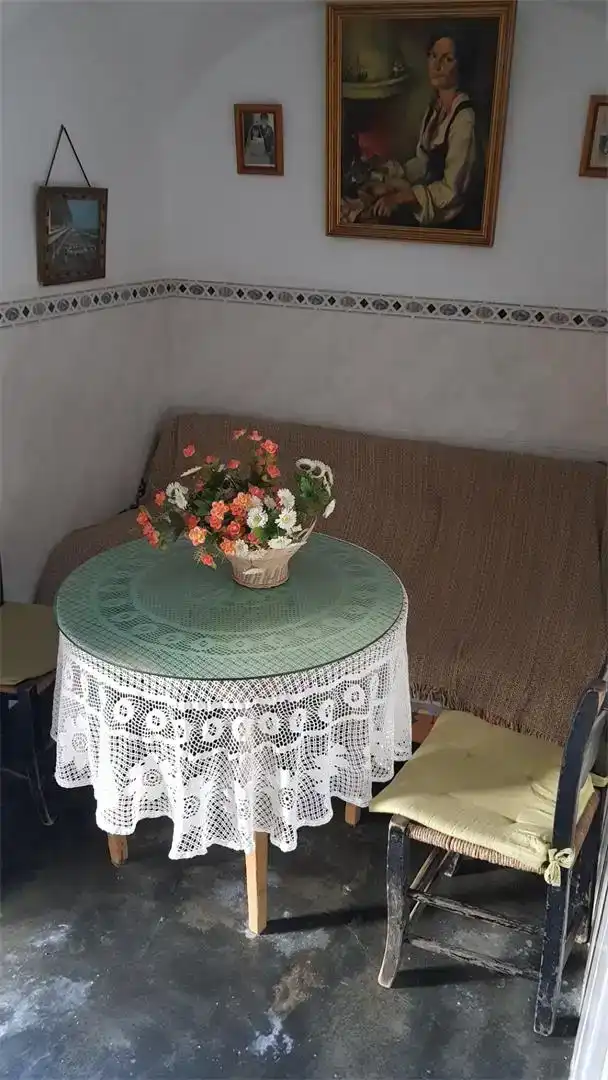Sala d'estar de Casa adosada en venda en Almoharín amb Jardí privat i Rentadora