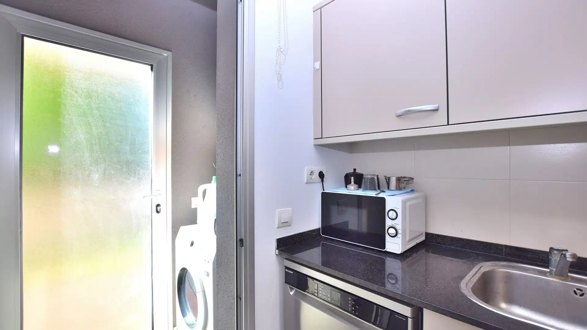 Küche von Wohnung zum Verkauf in Salou mit Klimaanlage, Heizung und Privatgarten