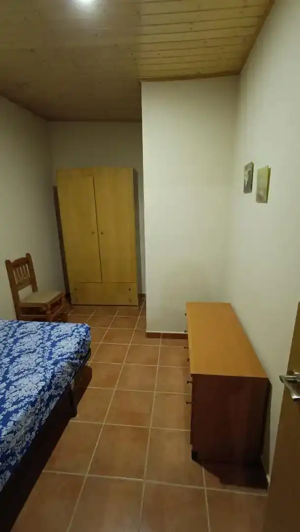 Dormitori de Casa adosada en venda en Fresneda de la Sierra amb Moblat
