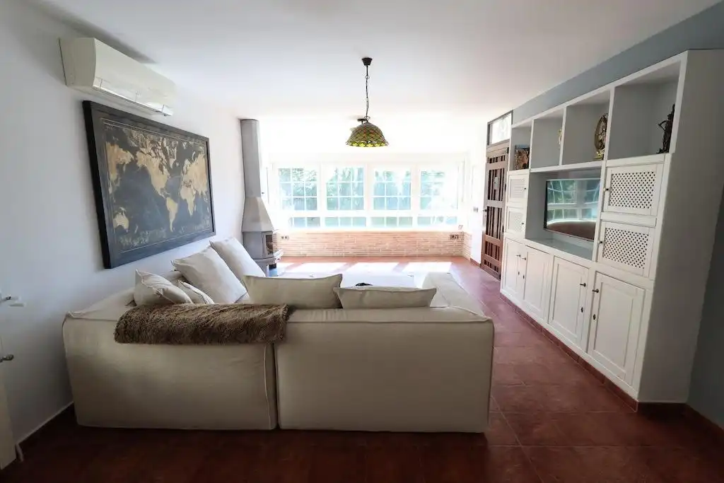 Sala d'estar de Casa o xalet en venda en Orihuela amb Aire condicionat, Jardí privat i Terrassa
