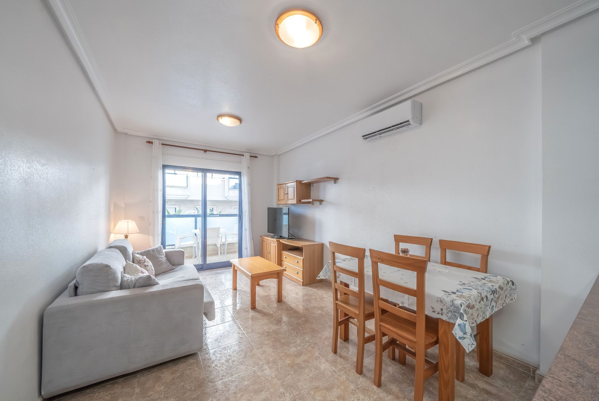 Living room of Flat for sale in Orihuela  with Air Conditioner, Terrace and Furnished