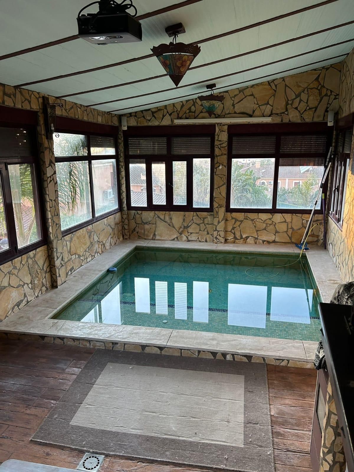 Piscina de Casa adosada en venta en La Línea de la Concepción con Jardín privado, Terraza y Piscina comunitaria