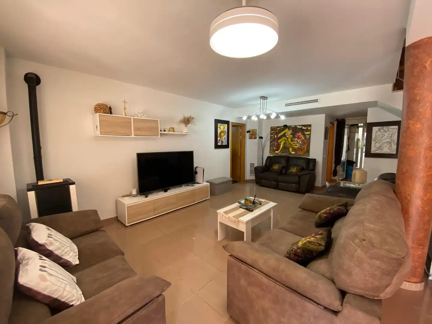 Sala d'estar de Casa adosada en venda en Bellreguard amb Aire condicionat, Jardí privat i Traster